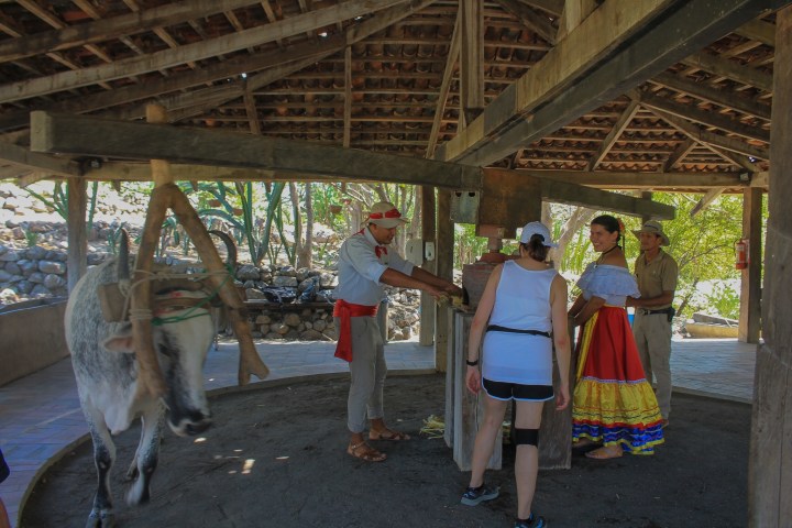 a group of people standing in front of a building